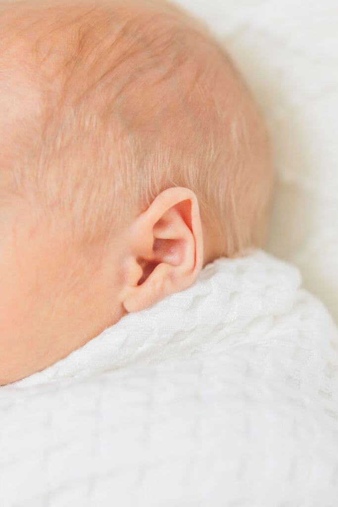 Emmett newborn photographer close-up newborn detail of baby ear and hair