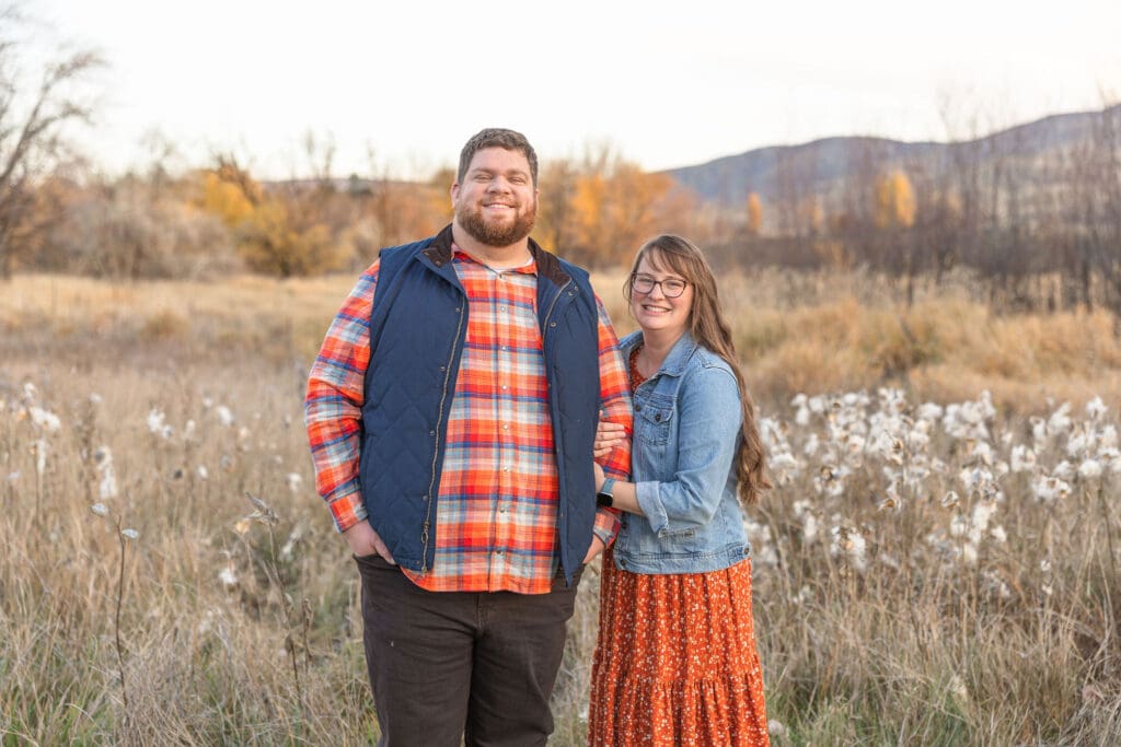 Couple portrait in a golden field during an outdoor family photography session